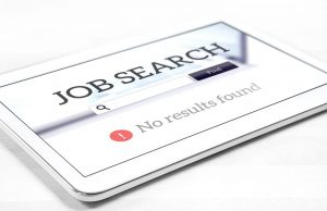 Online job adverts down by half