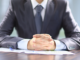 Director of umbrella scheme banned for eight years